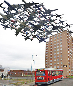 Planes flying over a tower block